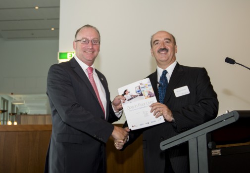 One In Four Lives group speaker Dr George Margelis presenting the white paper to MP Steve Irons, Chair of the House of Representatives Standing Committee on Health (representing the Minister for Health).
