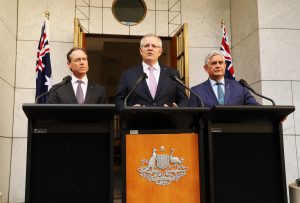 Greg Hunt (L), Scott Morrison (C) and Ken Wyatt (R)