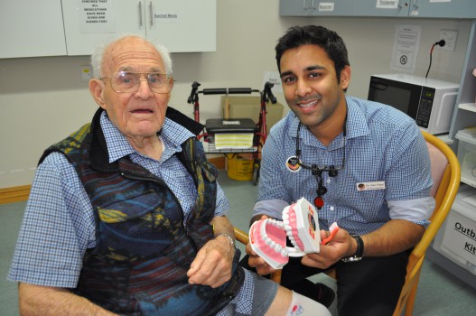 MercyCare resident Ron Willmott and KDT senior dental officer Dr Jilen Patel