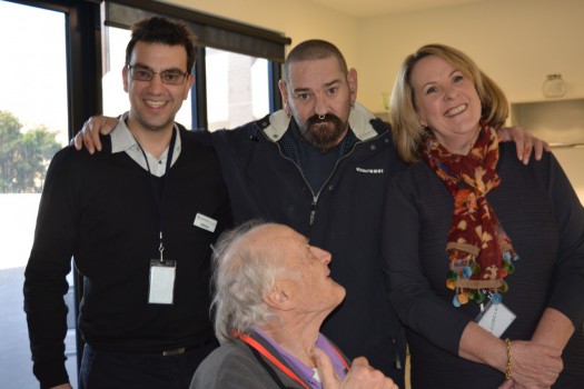 Liz Thomas with Common Ground staff and residents