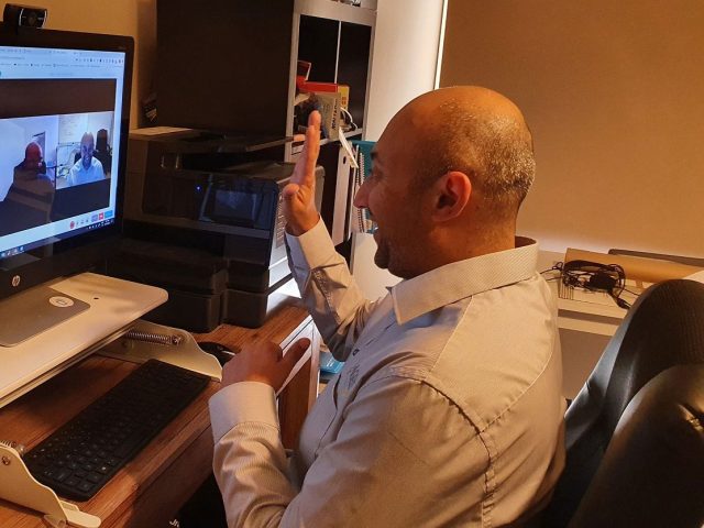 Dr-Sachin-Patel-in-a-video-conference_new_min