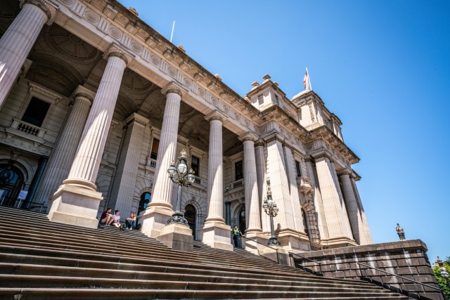 Front view of the parliament of Victoria house with stairs leading to the main entrance from Spring street in Melbourne Victoria Australia
