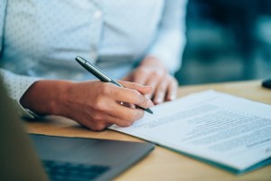 business woman writing