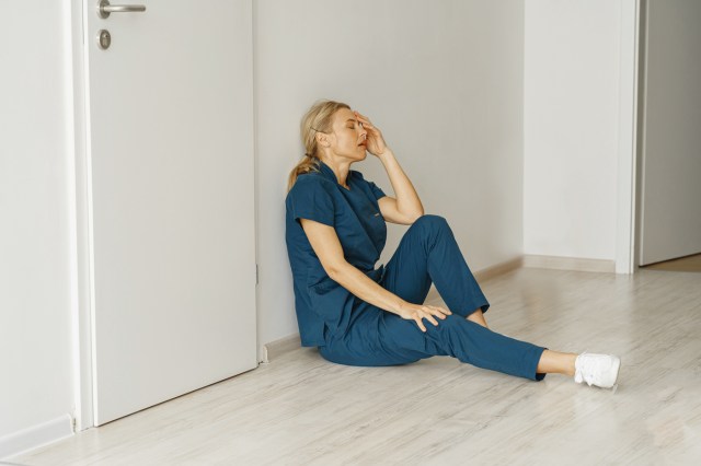 exhausted nurse worker