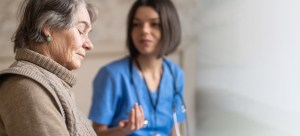 older woman and nurse