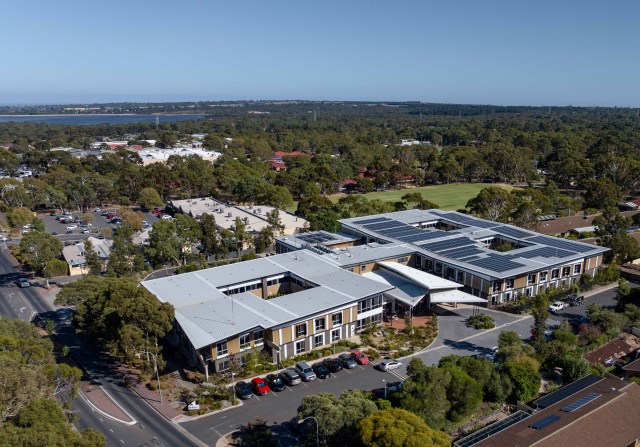 Resthaven Aberfoyle Park from the air showing solar panels, reserve adjacent and reservoir - smaller