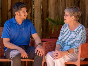 Cooinda nurse grad Rahul Taneja with a resident (1)