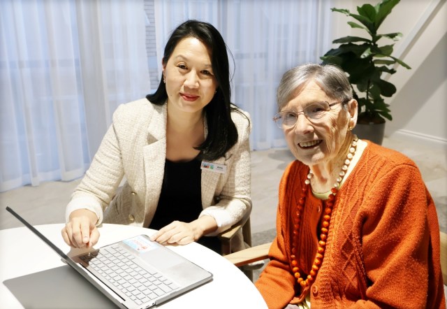 Pharmacist Anna Wong helps resident Mrs Coralie Wright with medication online
