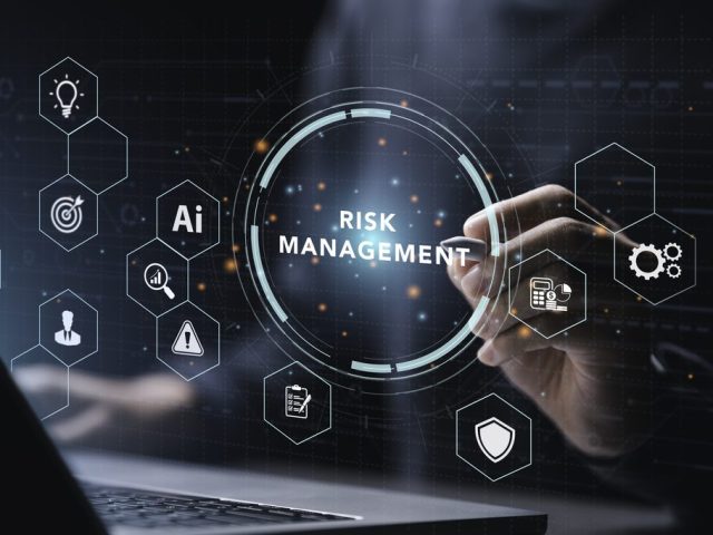 Businessman touching on screen to Risk Management and Assessment of business and enterprise. Risk Manage Strategy Plan Finance. Assessment for Investment Concept.