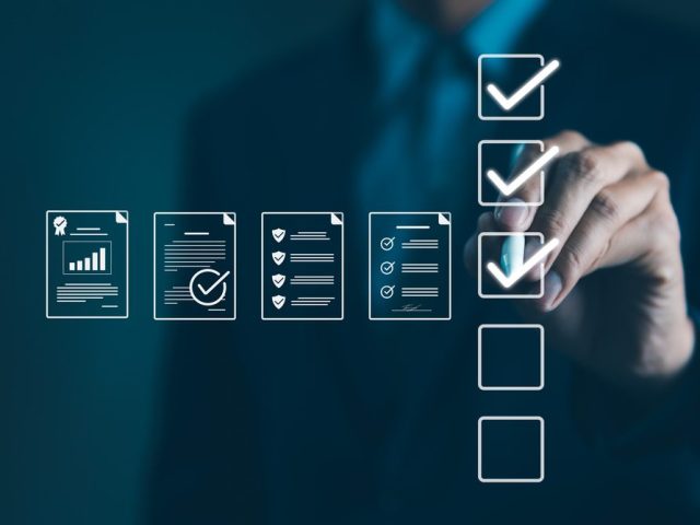 Quality Assurance and Document Control with Checklist Icons. Businessman mark off items on digital checklist, representing quality assurance and document control processes, verification and compliance