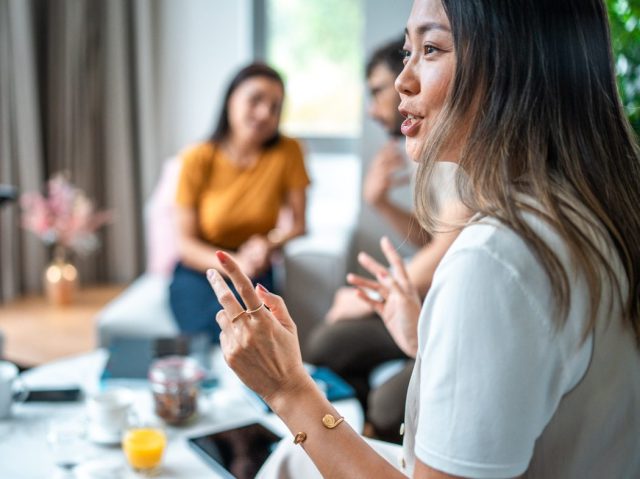 Diverse Team Engaged in Productive Business Meeting